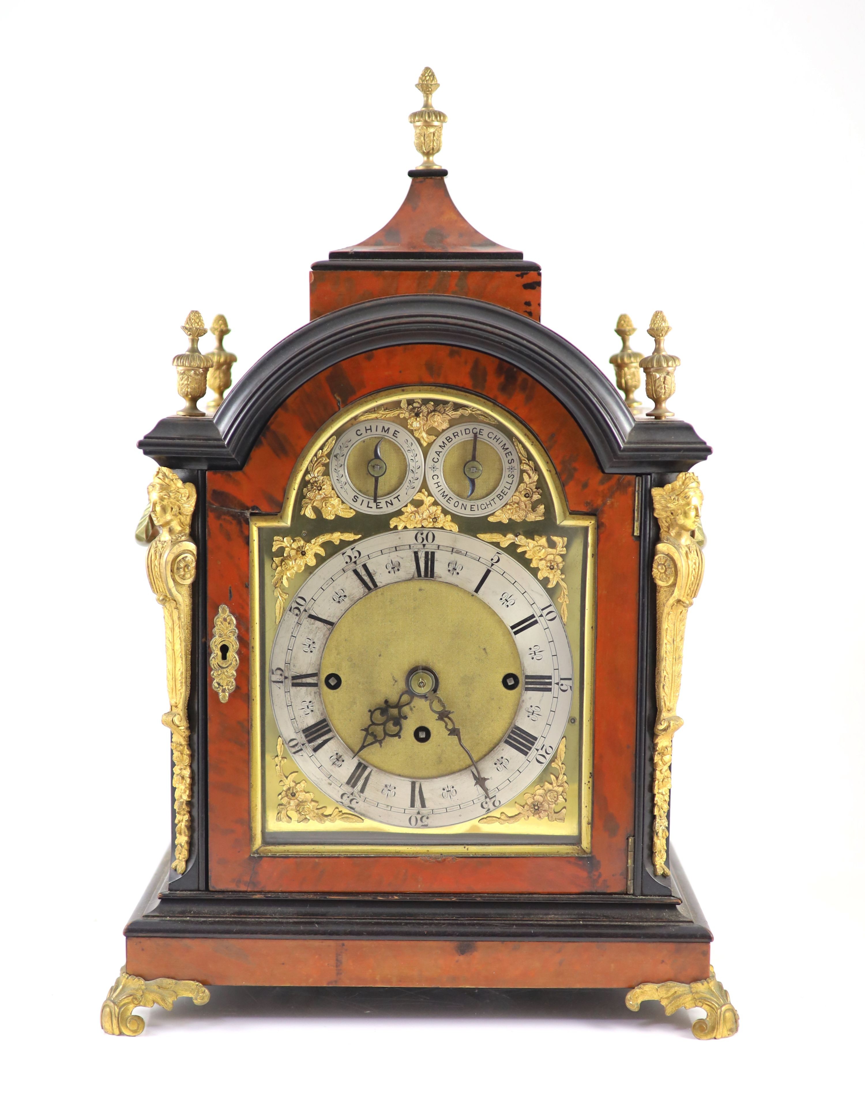 A late Victorian faux tortoiseshell and ebonised mantel clock 48cm high, 35 x 21cm